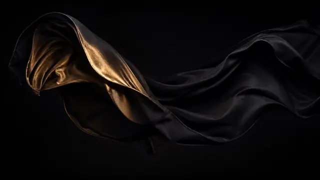 Lámina dorada flotante sobre fondo negro elegante