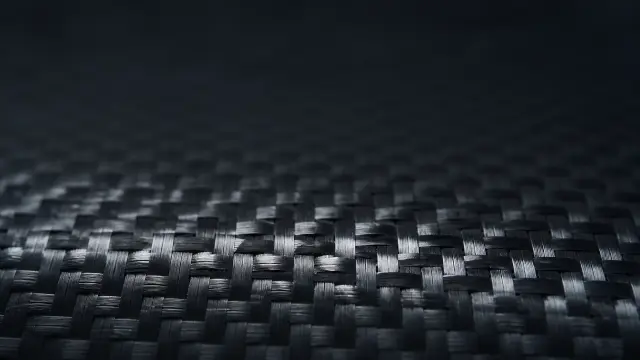Detalle de textura de fibra de carbono oscura